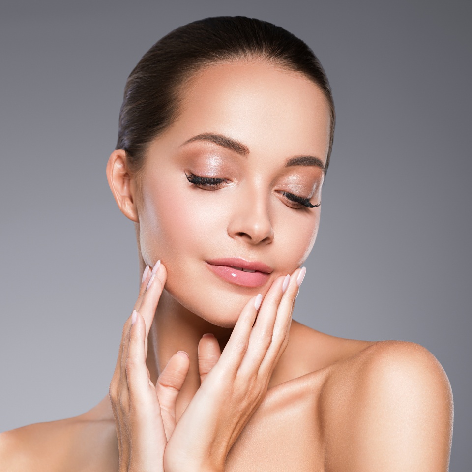 Beauty skin woman face clos up healthy hair and skin cosmetic natural makeup happy model emotional face manicure nails hand